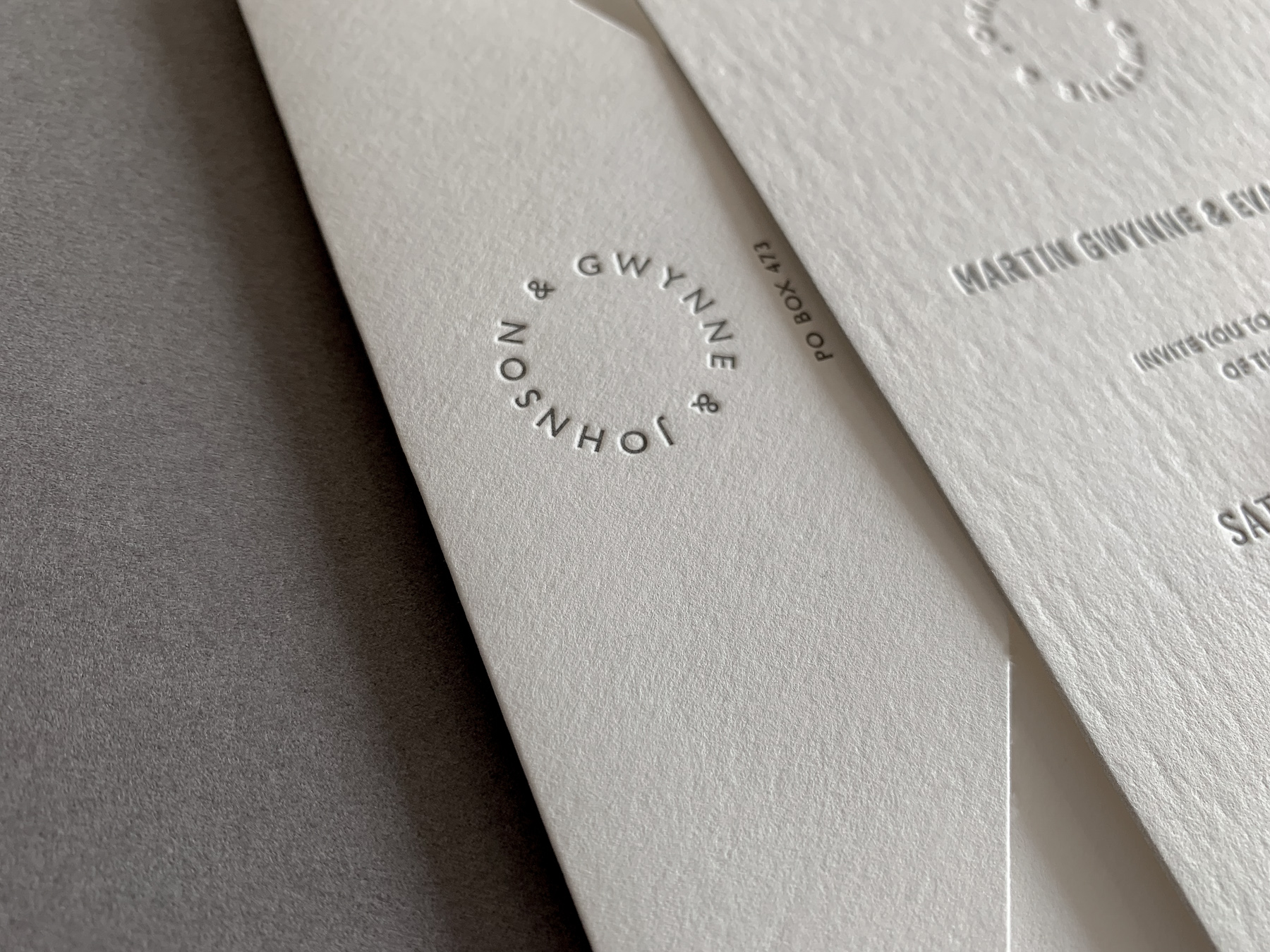 modern-wedding-invitations-letterpress-blind-monogram-evan-and-martin-on-wild-5