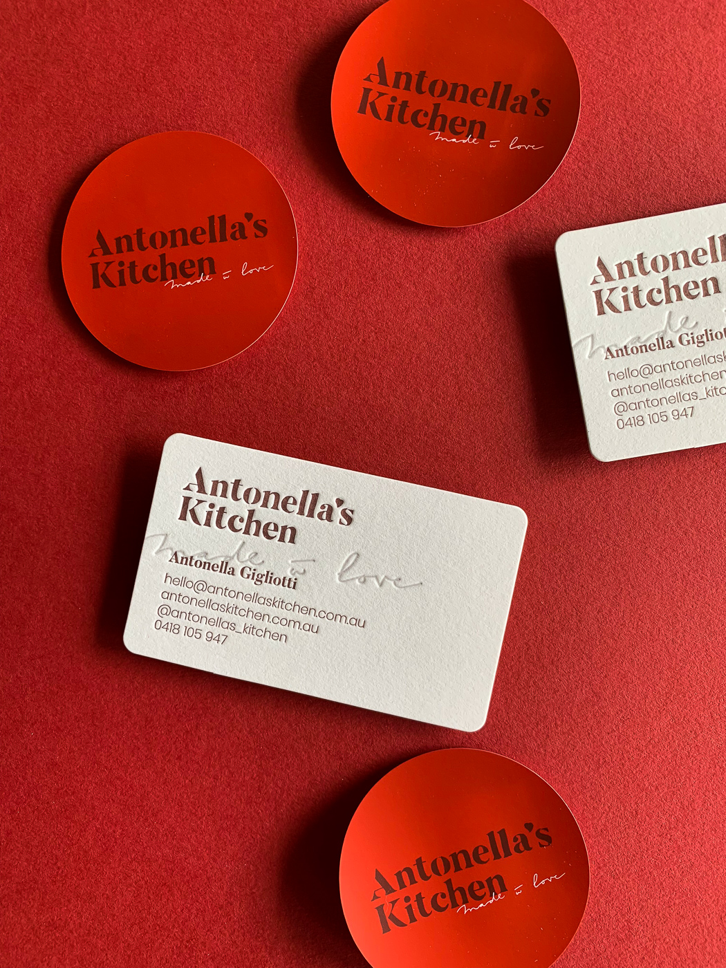 Custom letterpress business cards for Antonellas Kitchen on Stephen Gesso White